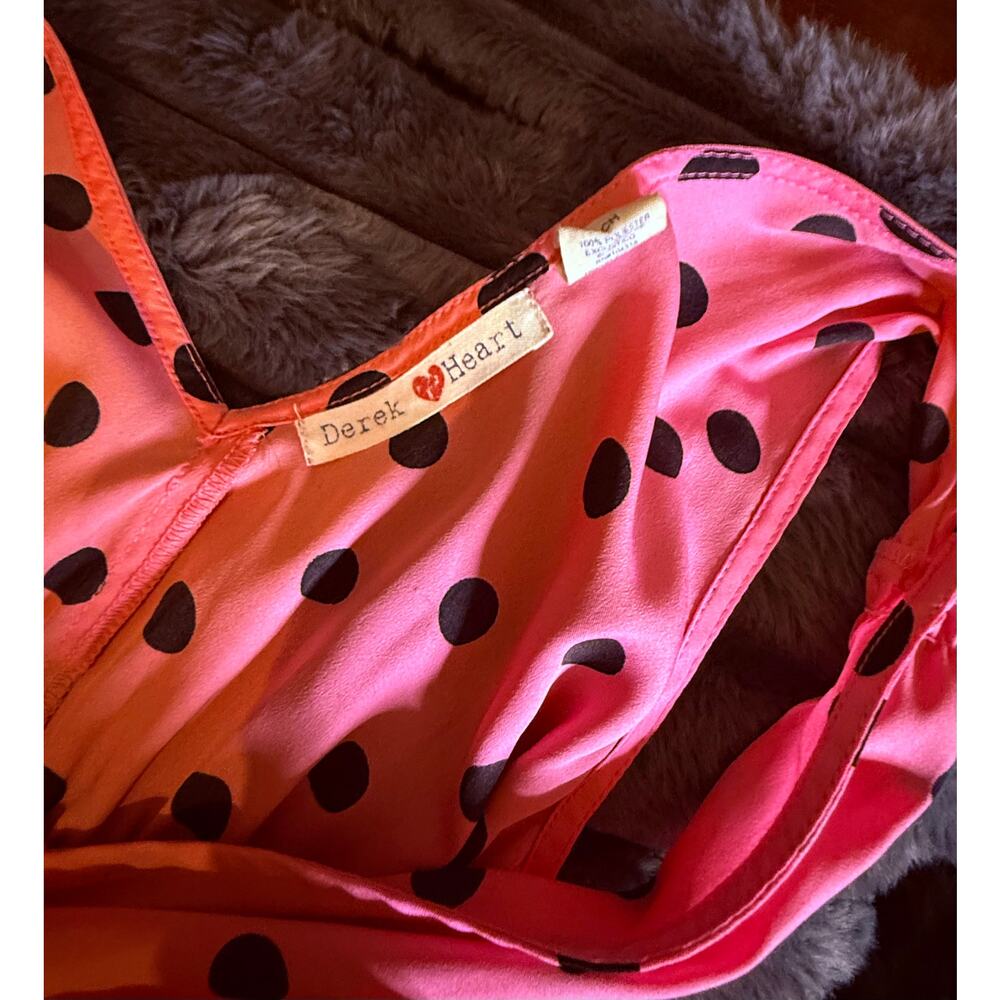 Pink dress with black polka dots
